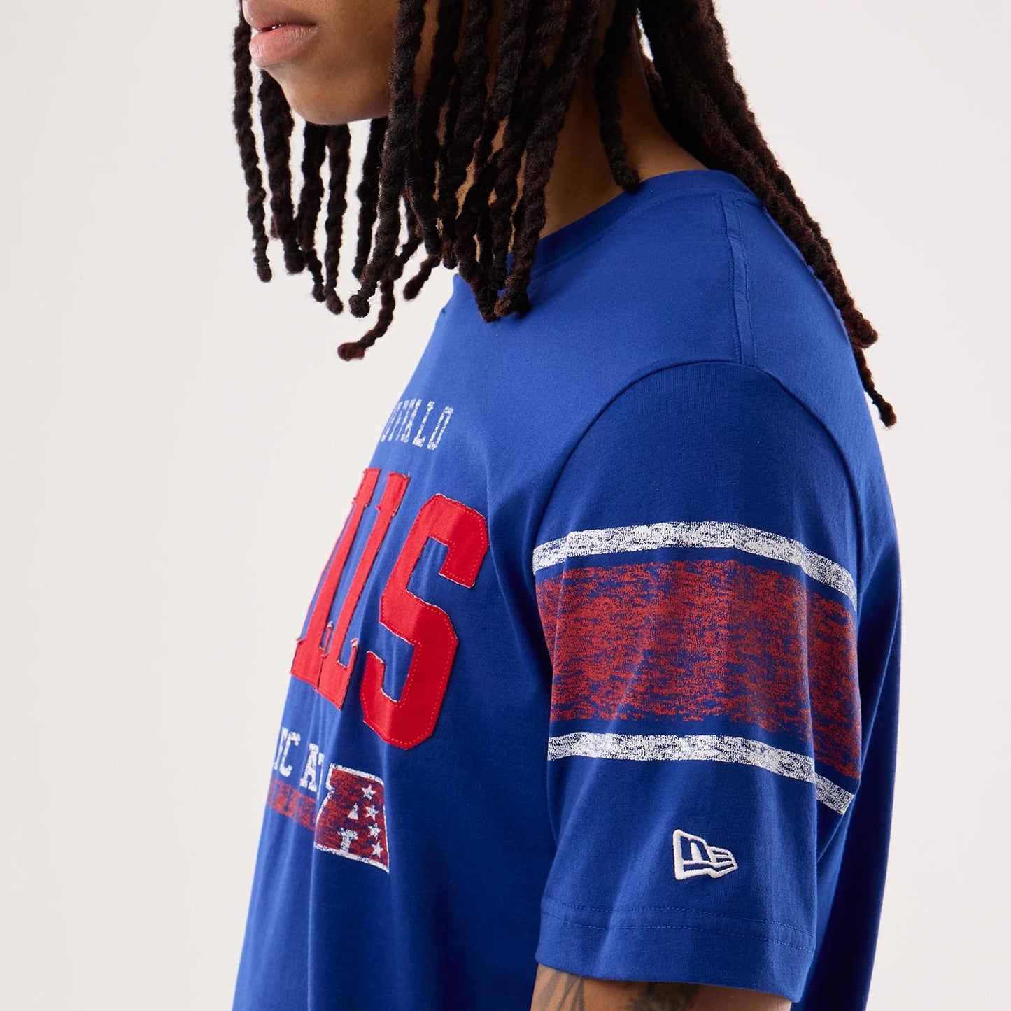 The model is wearing this NFL Sideline 2026 Buffalo Bills T-Shirt in blue. 4