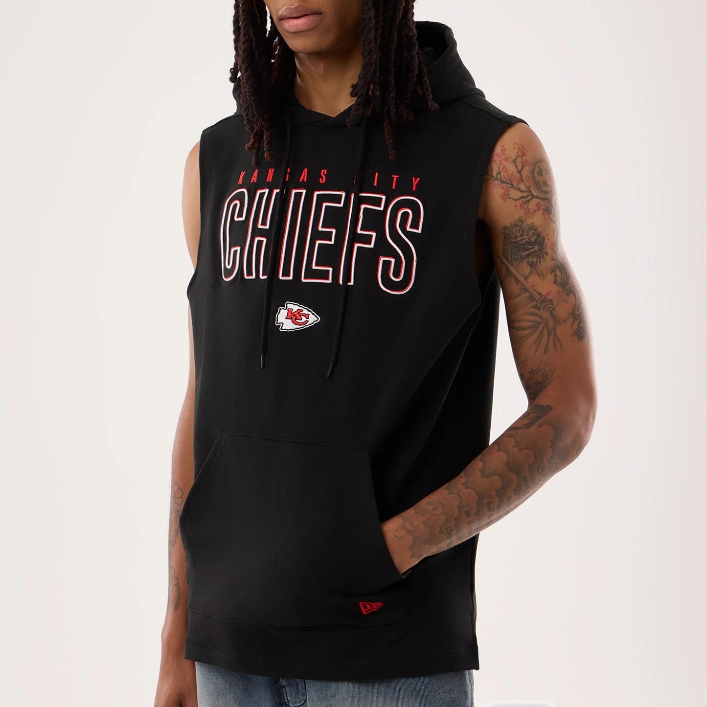 The model is wearing this NFL Sideline 2026 Kansas City Chiefs Tank Top in black. 3
