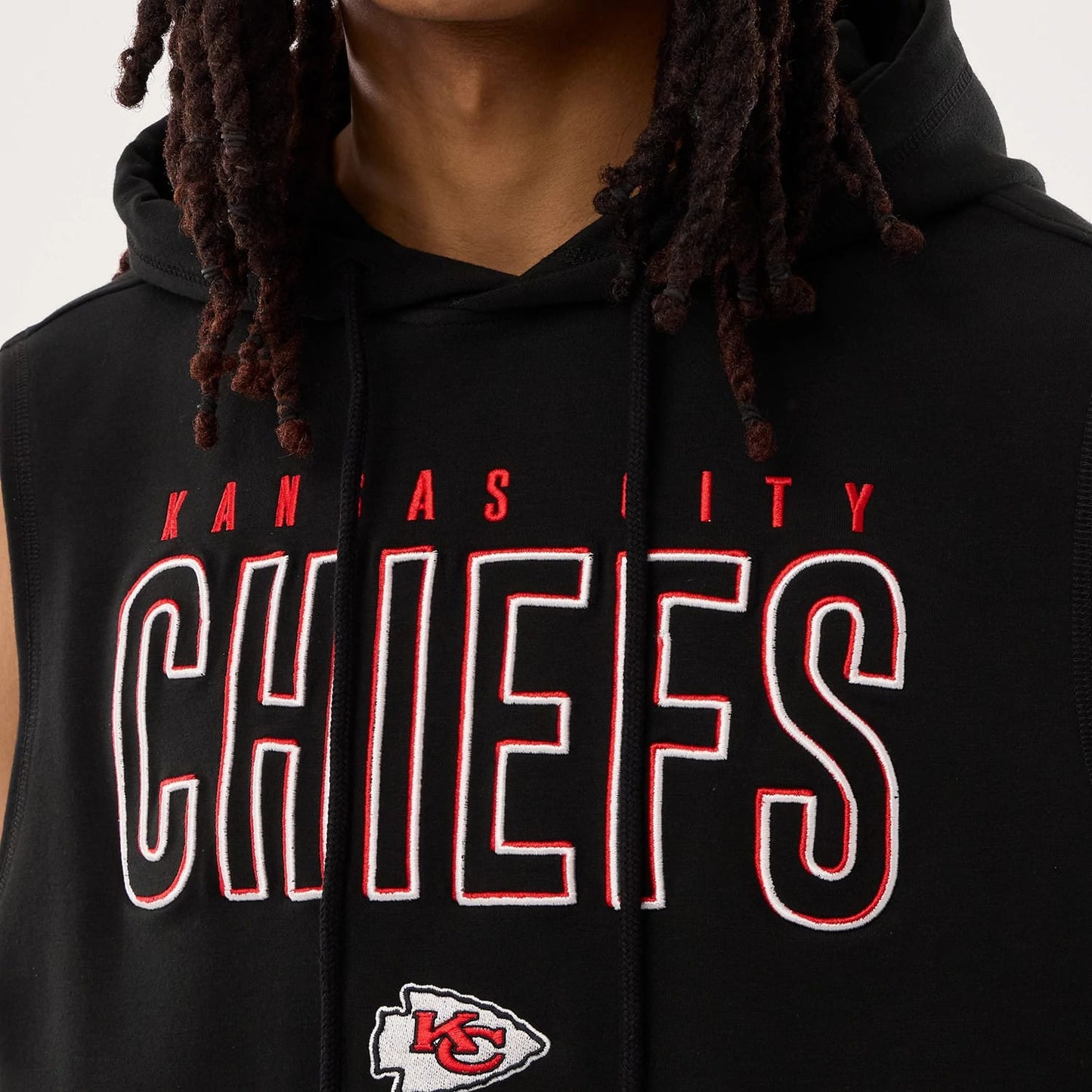 The model is wearing this NFL Sideline 2026 Kansas City Chiefs Tank Top in black. 4