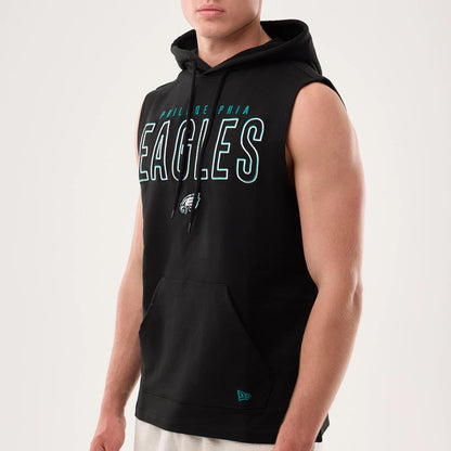 The model is wearing this NFL Sideline 2026 Philadelphia Eagles Tank Top in black. 4