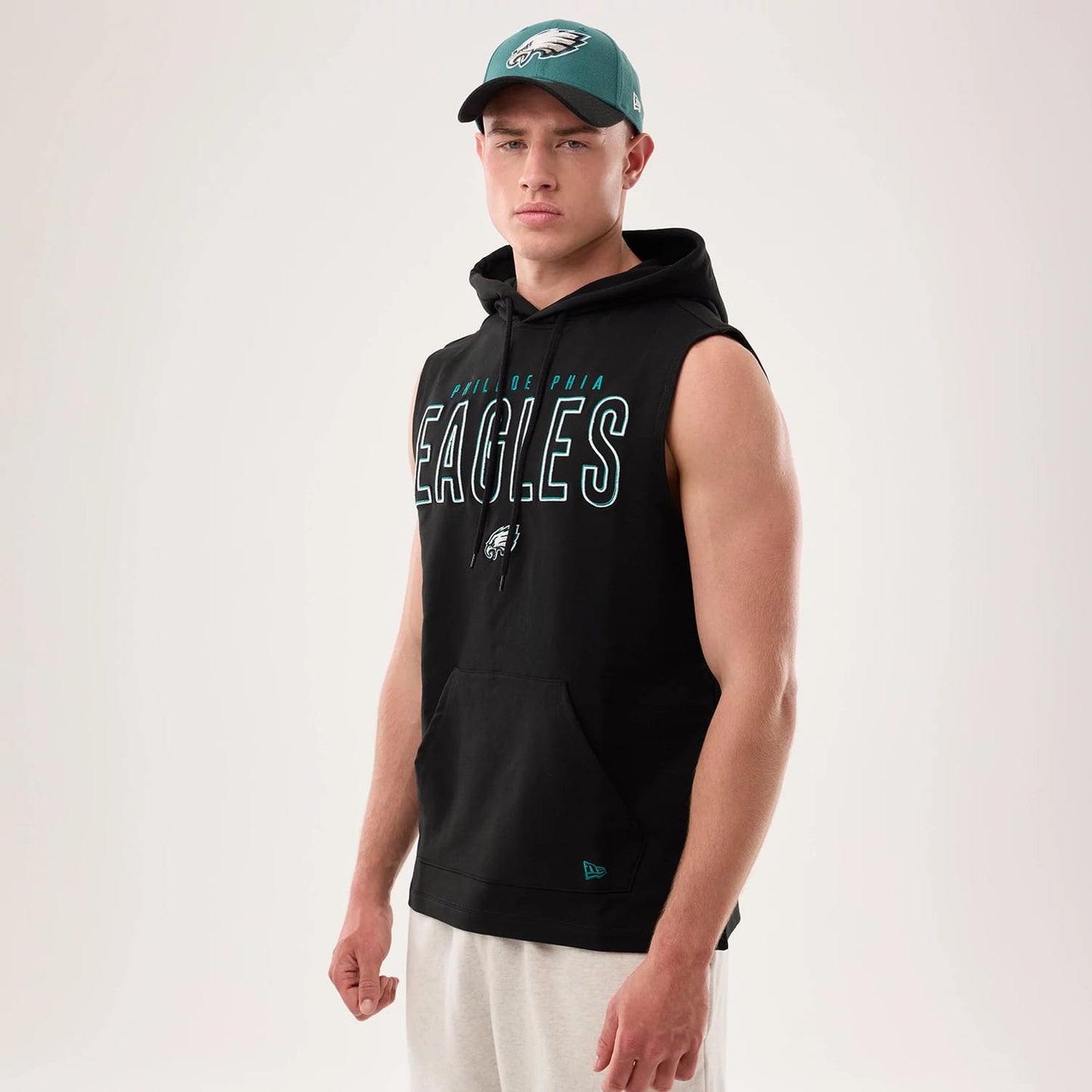 The model is wearing this NFL Sideline 2026 Philadelphia Eagles Tank Top in black. 1