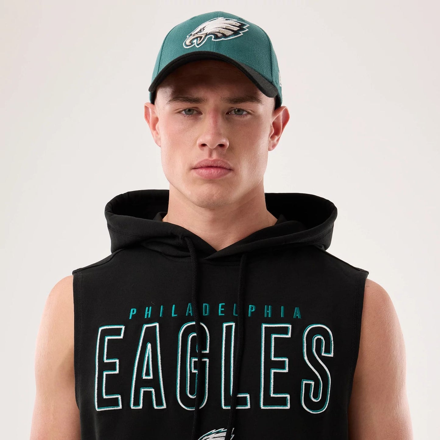 The model is wearing this NFL Sideline 2026 Philadelphia Eagles Tank Top in black. 6