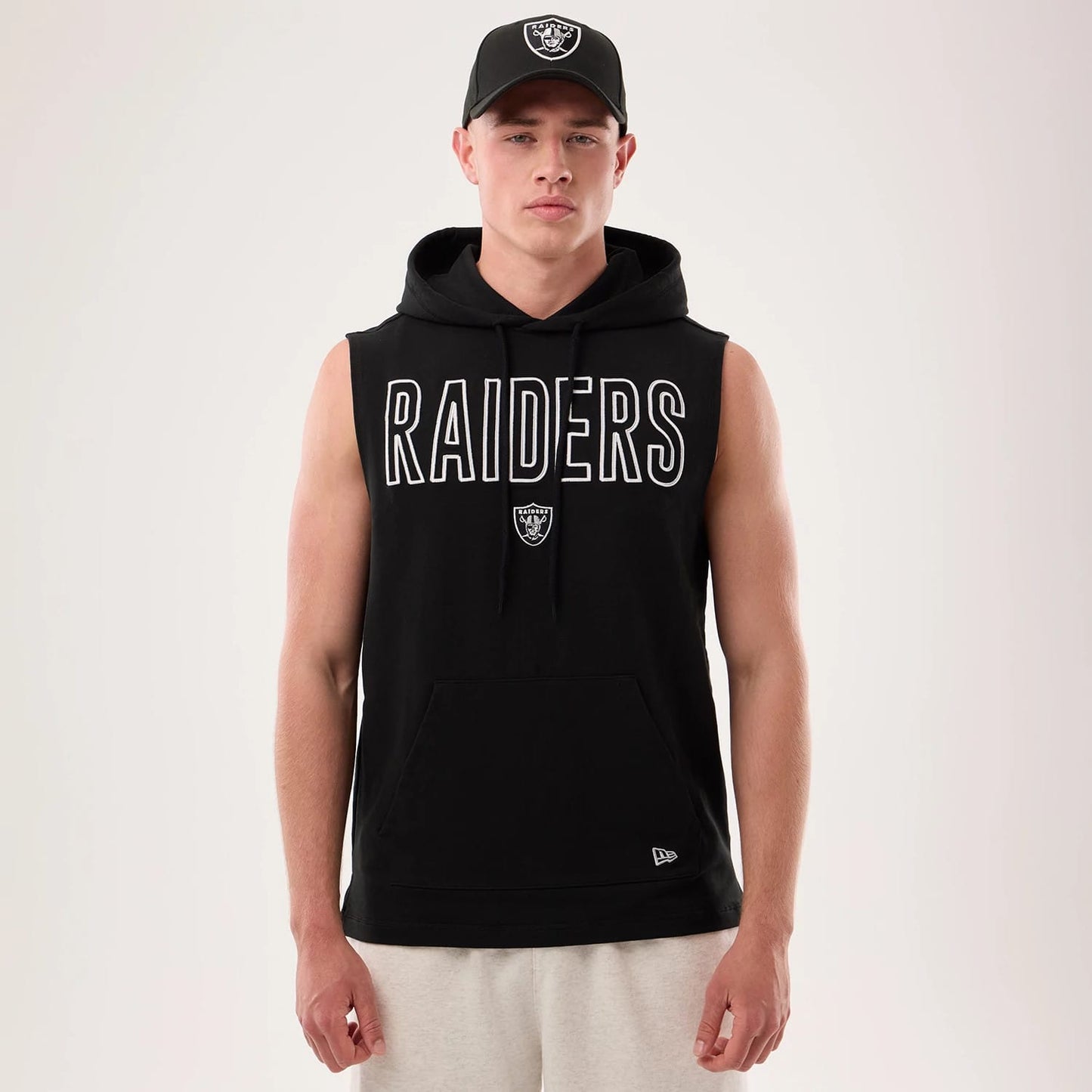 The model is wearing this NFL Sideline 2026 Las Vegas Raiders Tank Top in black. 1