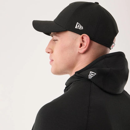 The model is wearing this NFL Sideline 2026 Las Vegas Raiders Balaclava Hoodie in black. 7