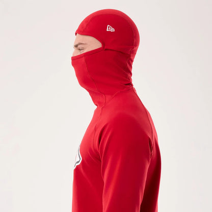 The model is wearing this NFL Sideline 2026 Kansas City Chiefs Balaclava Hoodie in red. 3