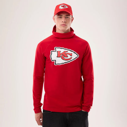 The model is wearing this NFL Sideline 2026 Kansas City Chiefs Balaclava Hoodie in red. 1