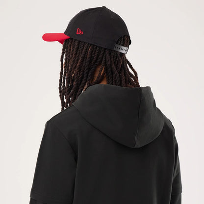 The model is wearing this NFL Sideline 2026 San Francisco 49ers Double Sleeve Hoodie in black. 6