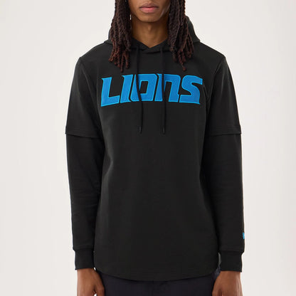 The model is wearing this NFL Sideline 2026 Detroit Lions Double Sleeve Hoodie in black. 3
