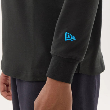 The model is wearing this NFL Sideline 2026 Detroit Lions Double Sleeve Hoodie in black. 5