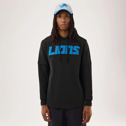 The model is wearing this NFL Sideline 2026 Detroit Lions Double Sleeve Hoodie in black. 1