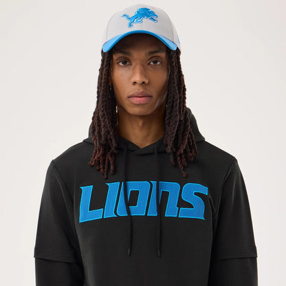The model is wearing this NFL Sideline 2026 Detroit Lions Double Sleeve Hoodie in black. 6