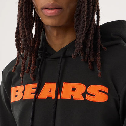 The model is wearing this NFL Sideline 2026 Chicago Bears Double Sleeve Hoodie in black. 7