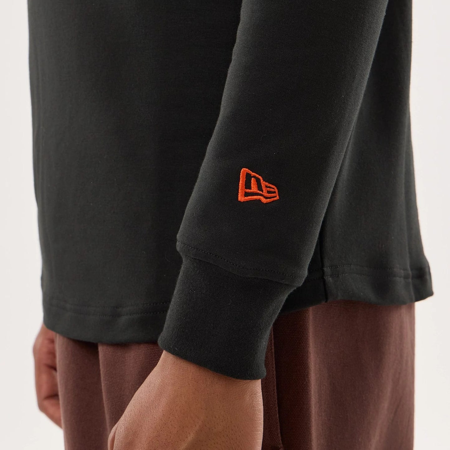 The model is wearing this NFL Sideline 2026 Chicago Bears Double Sleeve Hoodie in black. 4