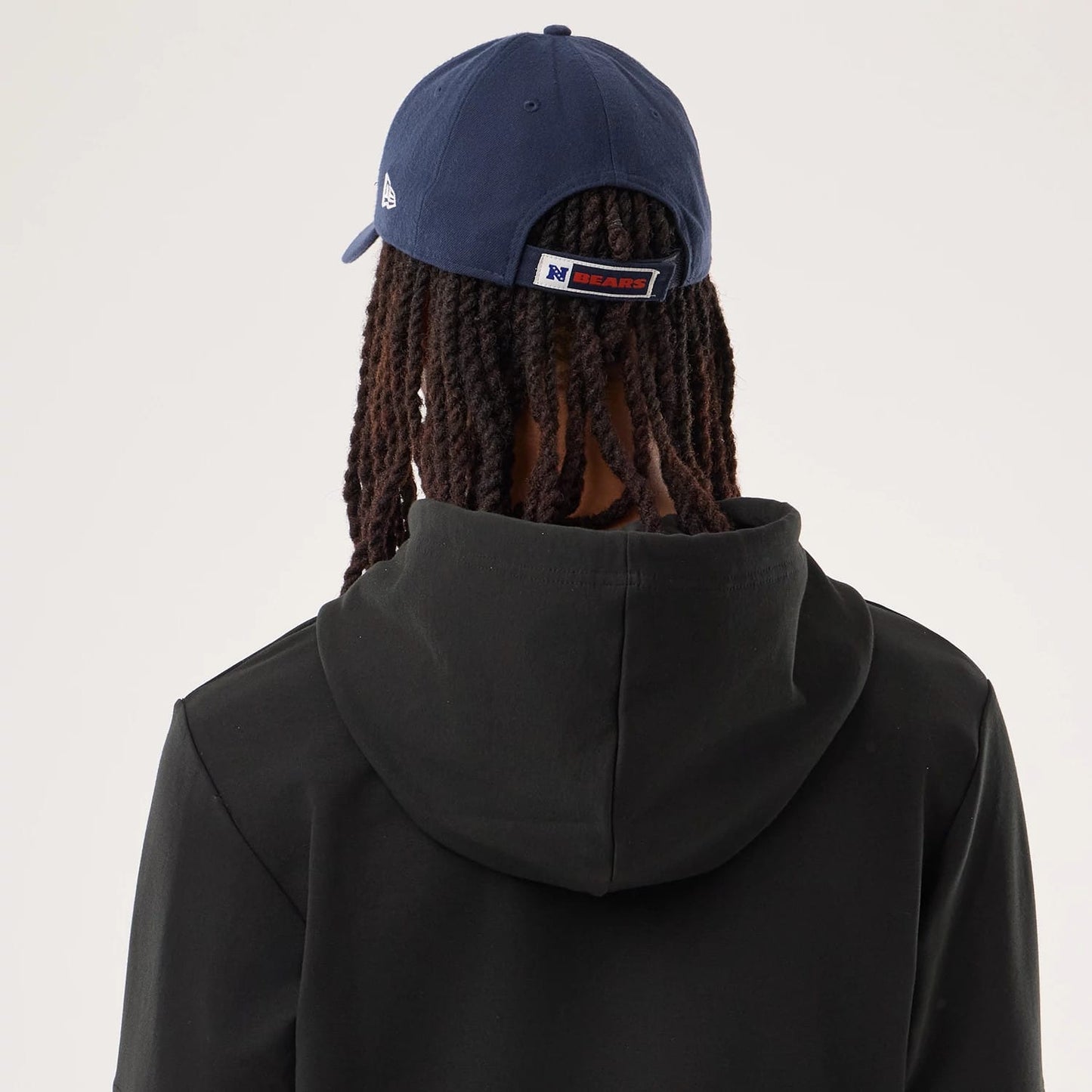 The model is wearing this NFL Sideline 2026 Chicago Bears Double Sleeve Hoodie in black. 6