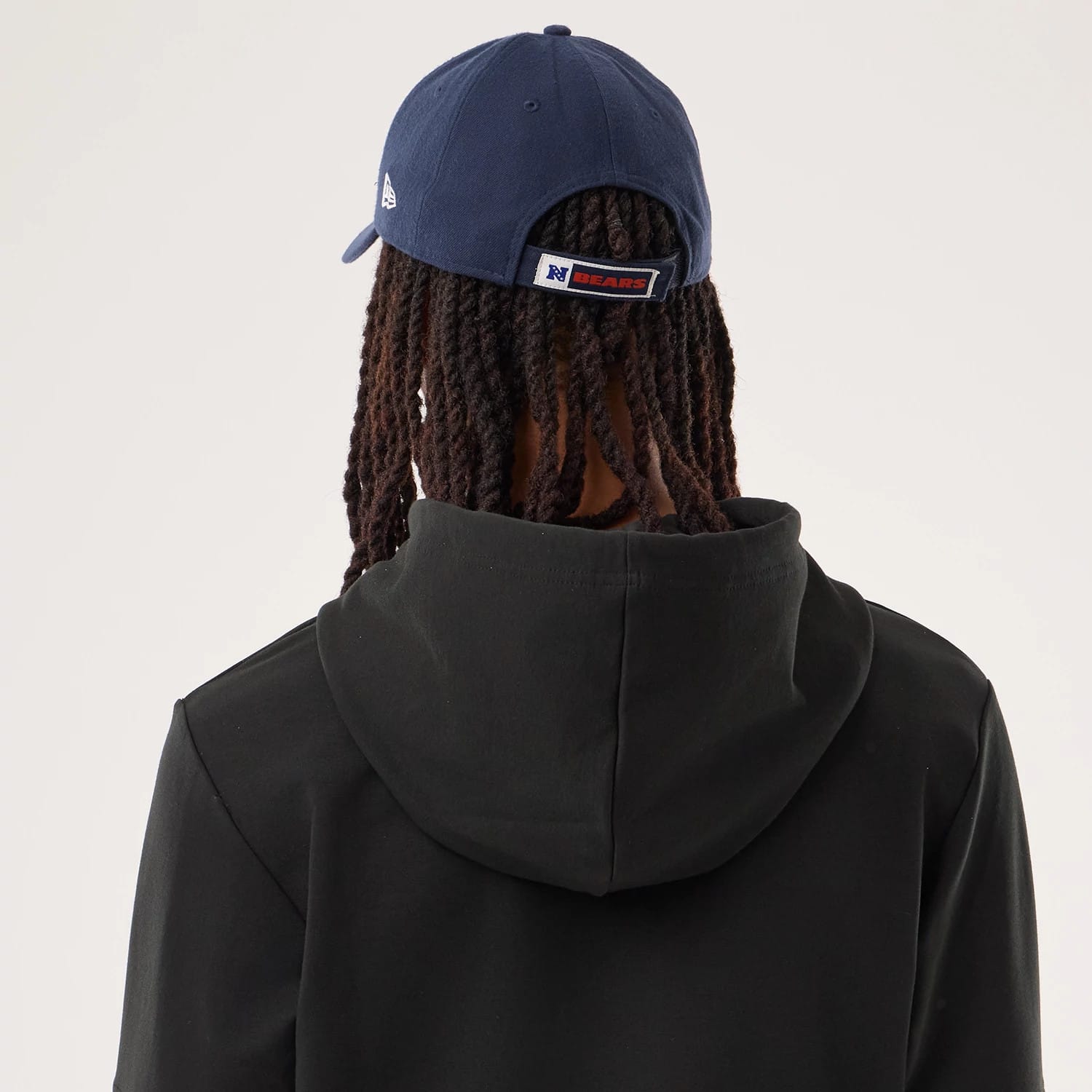 The model is wearing this NFL Sideline 2026 Chicago Bears Double Sleeve Hoodie in black. 6