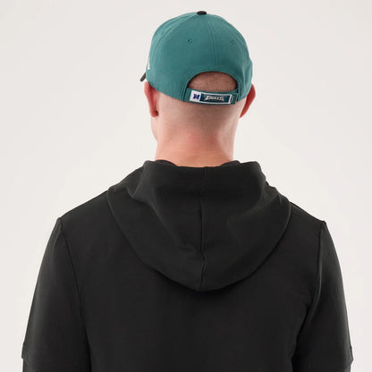 The model is wearing this NFL Sideline 2026 Philadelphia Eagles Double Sleeve Hoodie in black. 7