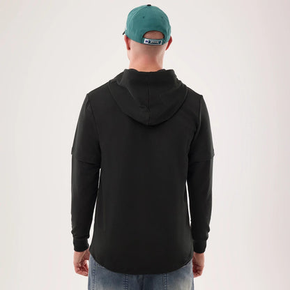 The model is wearing this NFL Sideline 2026 Philadelphia Eagles Double Sleeve Hoodie in black. 2