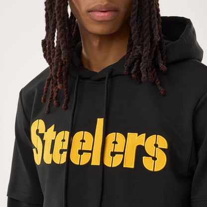 The model is wearing this NFL Sideline 2026 Pittsburgh Steelers Double Sleeve Hoodie in black. 4