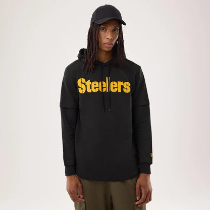 The model is wearing this NFL Sideline 2026 Pittsburgh Steelers Double Sleeve Hoodie in black. 1