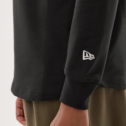The model is wearing this NFL Sideline 2026 Las Vegas Raiders Double Sleeve Hoodie in black. 5