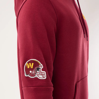 The model is wearing this NFL Sideline 2026 Washington Commanders Pullover Hoodie in dark red. 5