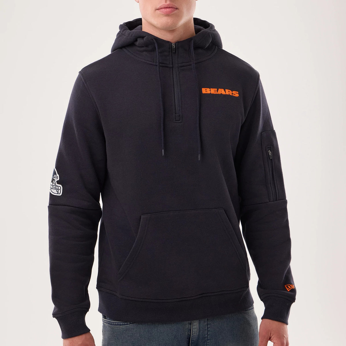 The model is wearing this NFL Sideline 2026 Chicago Bears Pullover Hoodie in navy. 5