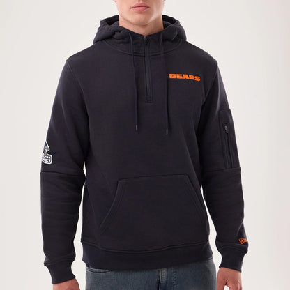 The model is wearing this NFL Sideline 2026 Chicago Bears Pullover Hoodie in navy. 5