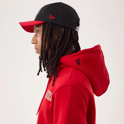 The model is wearing this NFL Sideline 2026 San Francisco 49ers Pullover Hoodie in red. 4