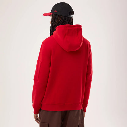 The model is wearing this NFL Sideline 2026 San Francisco 49ers Pullover Hoodie in red. 2