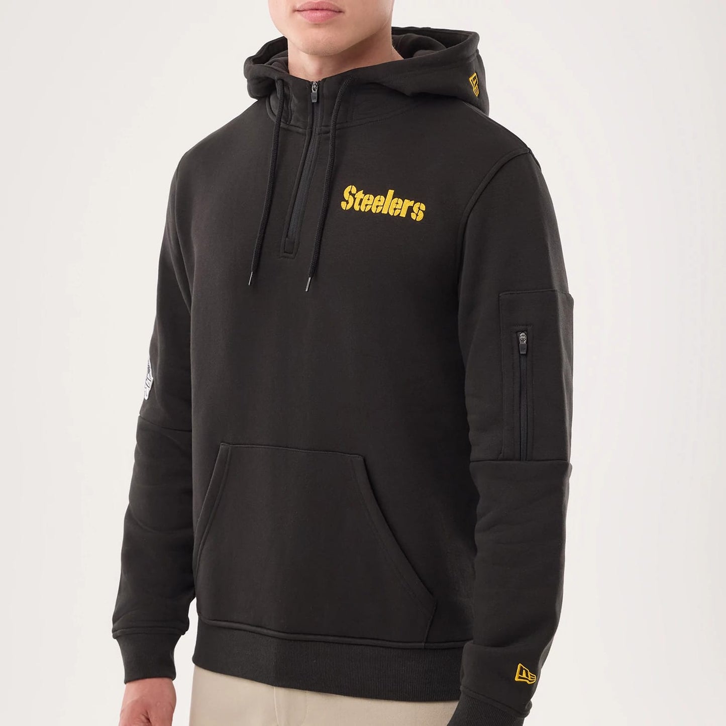 The model is wearing this NFL Sideline 2026 Pittsburgh Steelers Pullover Hoodie in black. 3