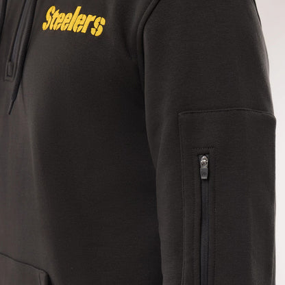 The model is wearing this NFL Sideline 2026 Pittsburgh Steelers Pullover Hoodie in black. 4