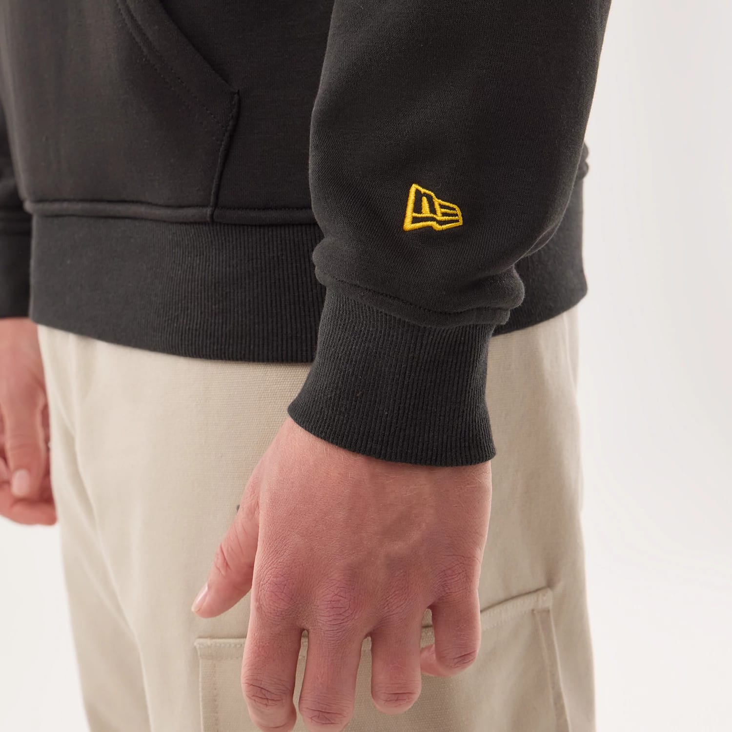 The model is wearing this NFL Sideline 2026 Pittsburgh Steelers Pullover Hoodie in black. 7