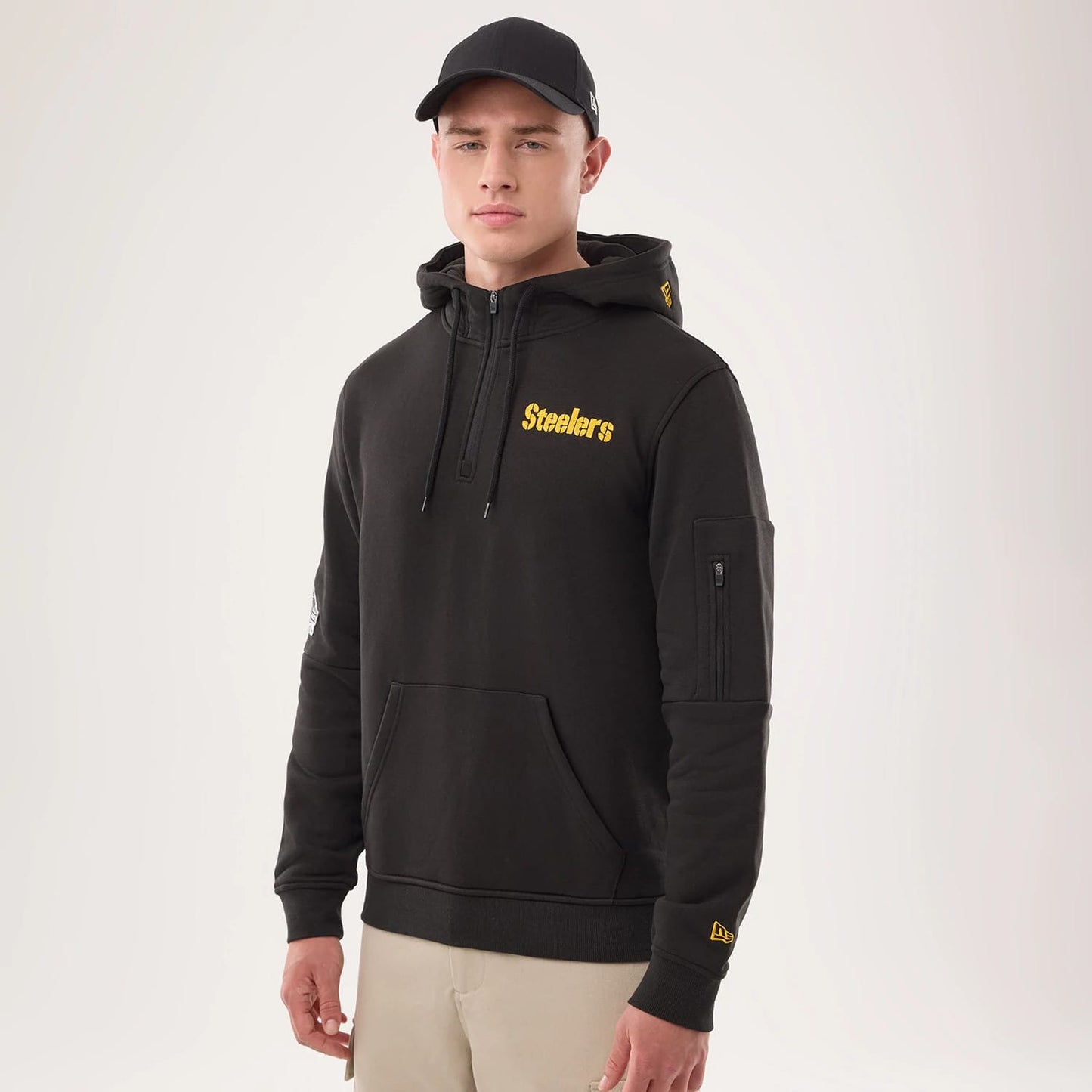 The model is wearing this NFL Sideline 2026 Pittsburgh Steelers Pullover Hoodie in black. 1