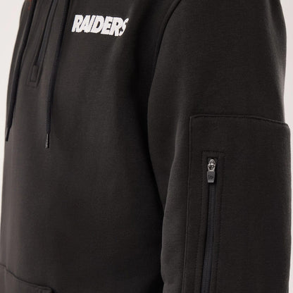 The model is wearing this NFL Sideline 2026 Las Vegas Raiders Pullover Hoodie in black. 4