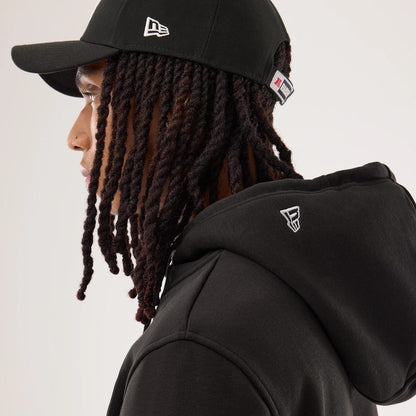 The model is wearing this NFL Sideline 2026 Las Vegas Raiders Pullover Hoodie in black. 7