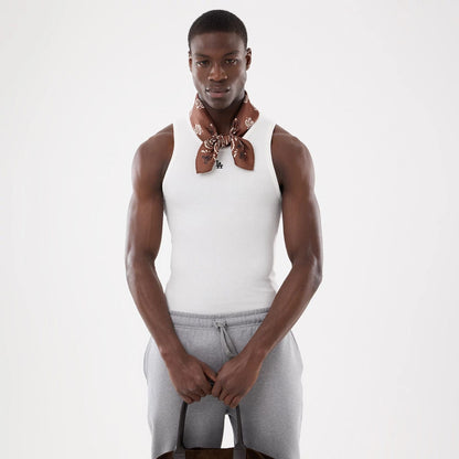 Pictured is this New Era Paisley Bandana in Brown. 7