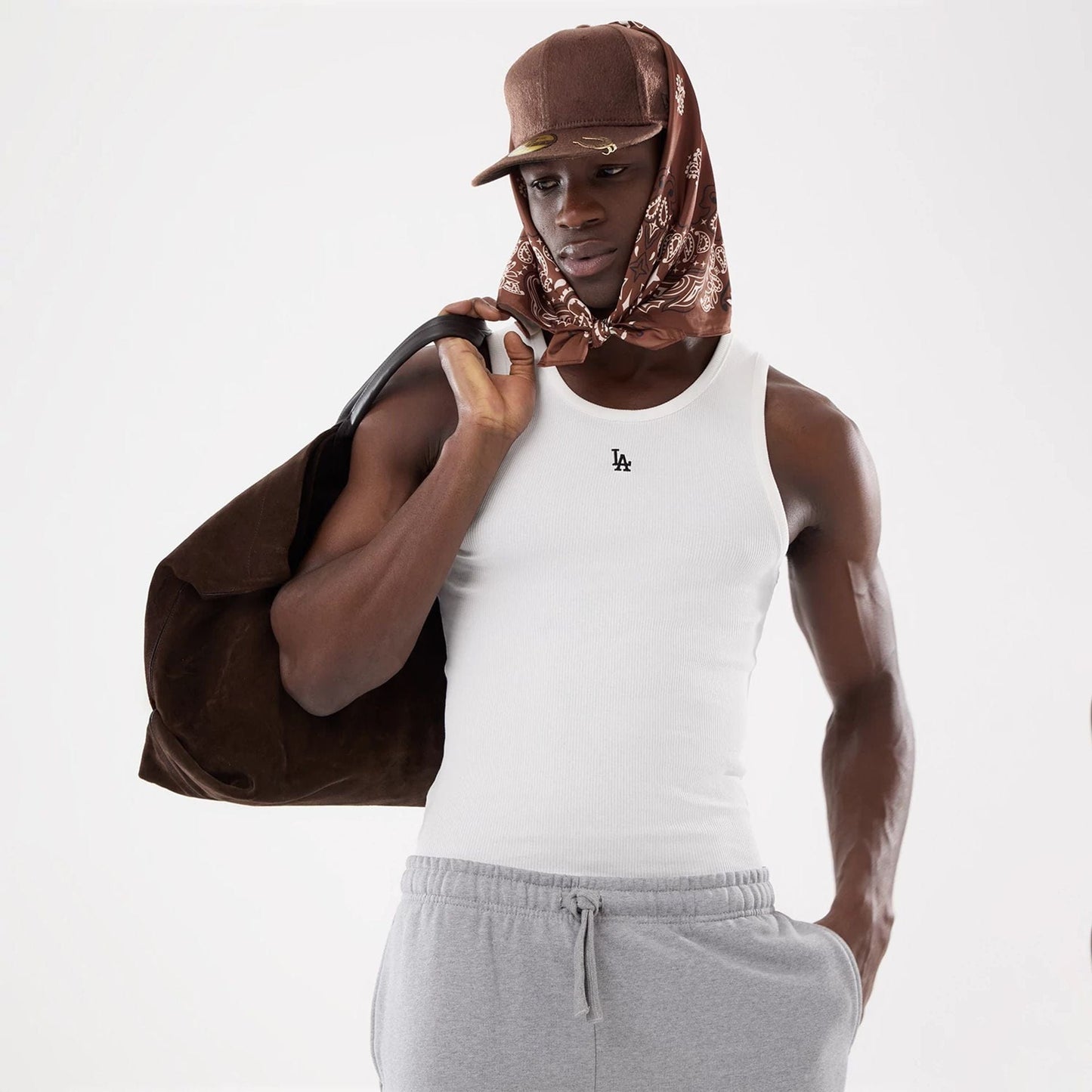 Pictured is this New Era Paisley Bandana in Brown. 8