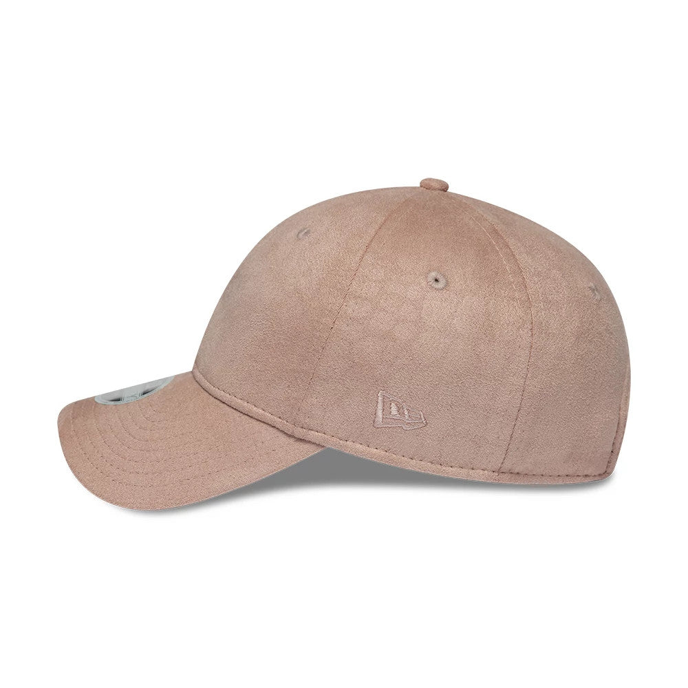 Womens New Era Textured Dusty Pink 9TWENTY Adjustable Cap, side view showing the pink embroidered New Era flag logo on the left side, lightly structured crown with matching dusty pink visor, embroidered eyelets, and top button.