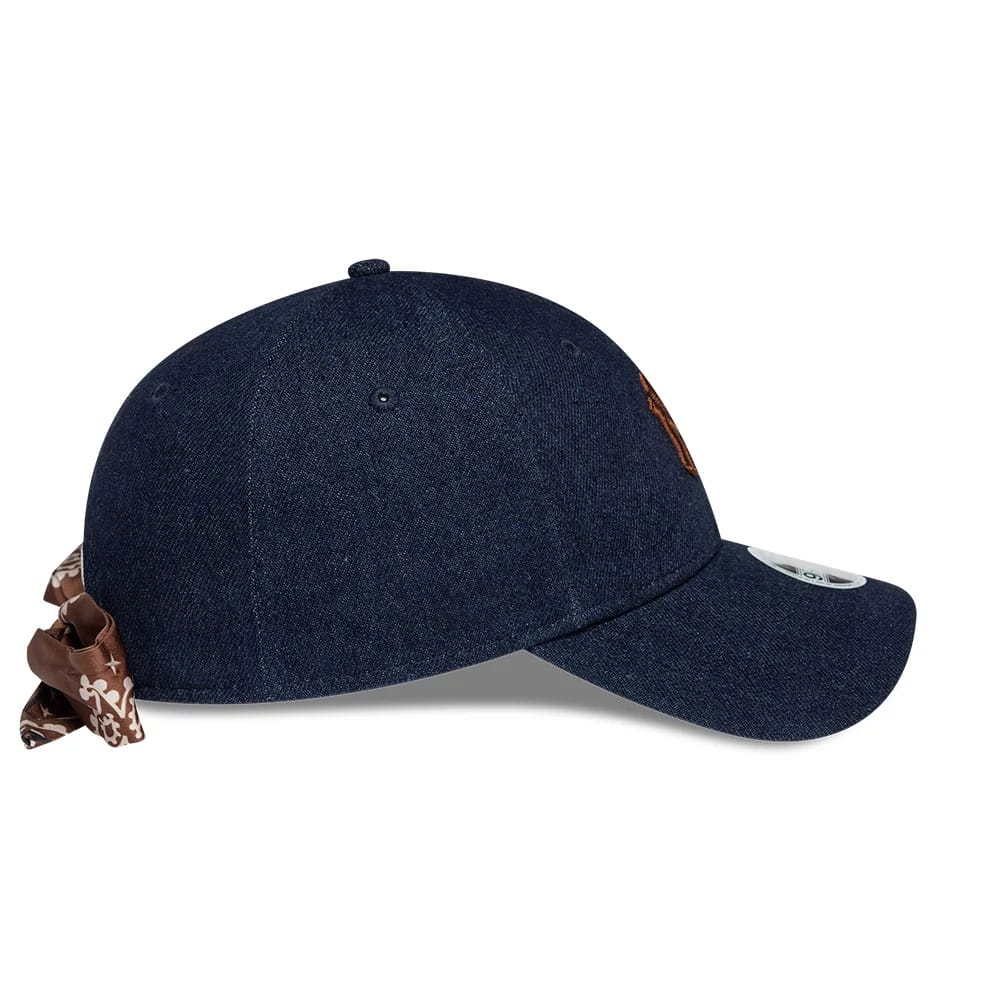 Pictured is this Womens MLB Denim New York Yankees 9FORTY Bowback cap in navy. 6