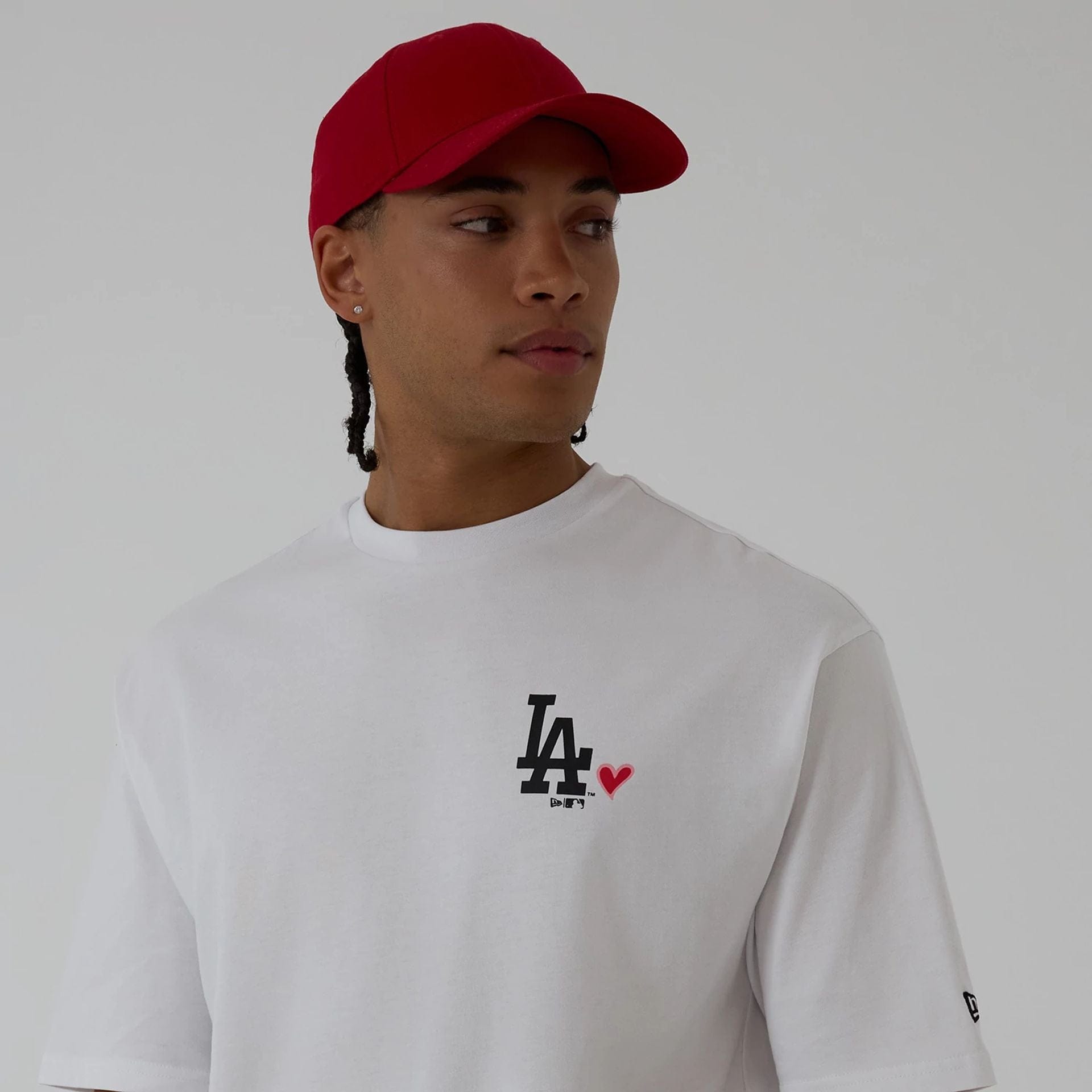 The model is wearing this MLB Heart Graphic LA Dodgers T-Shirt in white. 6