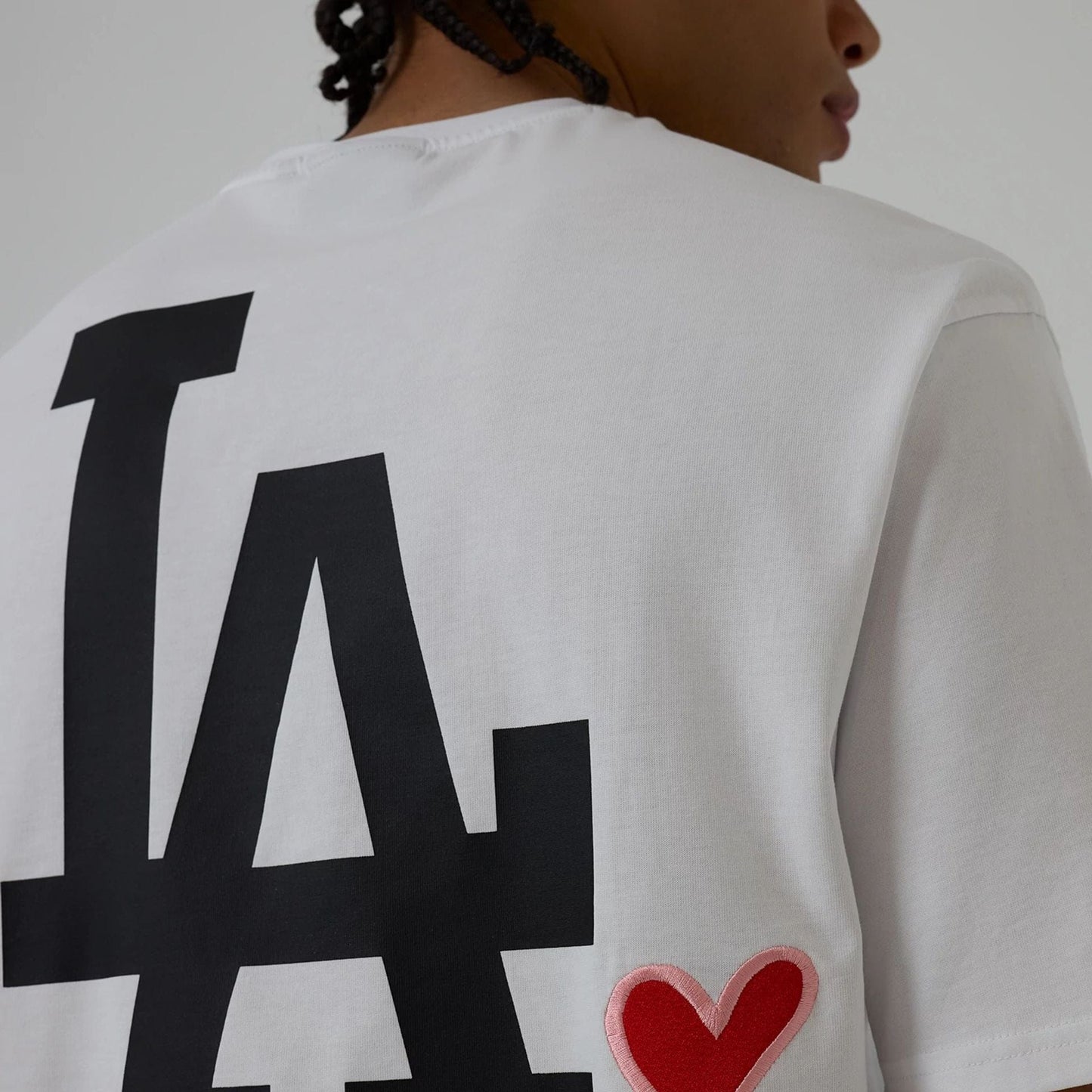 The model is wearing this MLB Heart Graphic LA Dodgers T-Shirt in white. 7