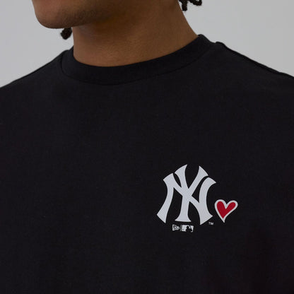 The model is wearing this MLB Heart Graphic New York Yankees T-Shirt in black. 4
