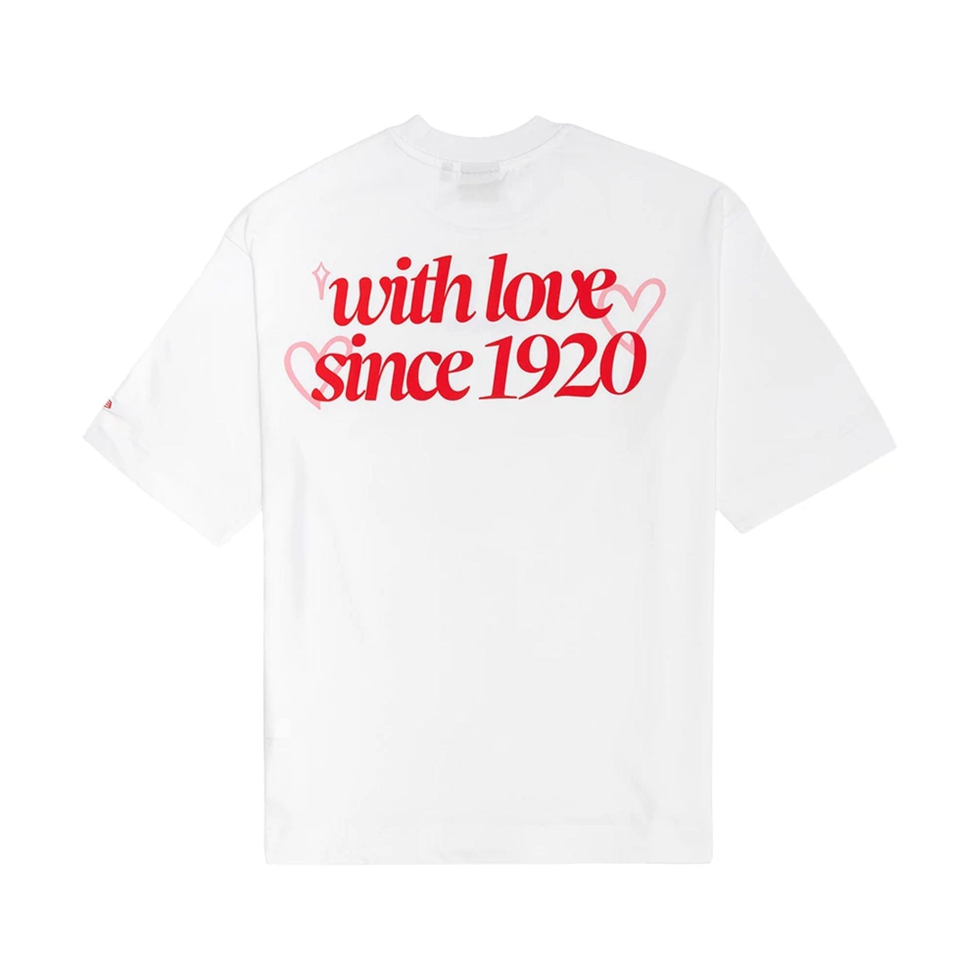 The model is wearing this New Era Love Graphic T-Shirt in white. 2