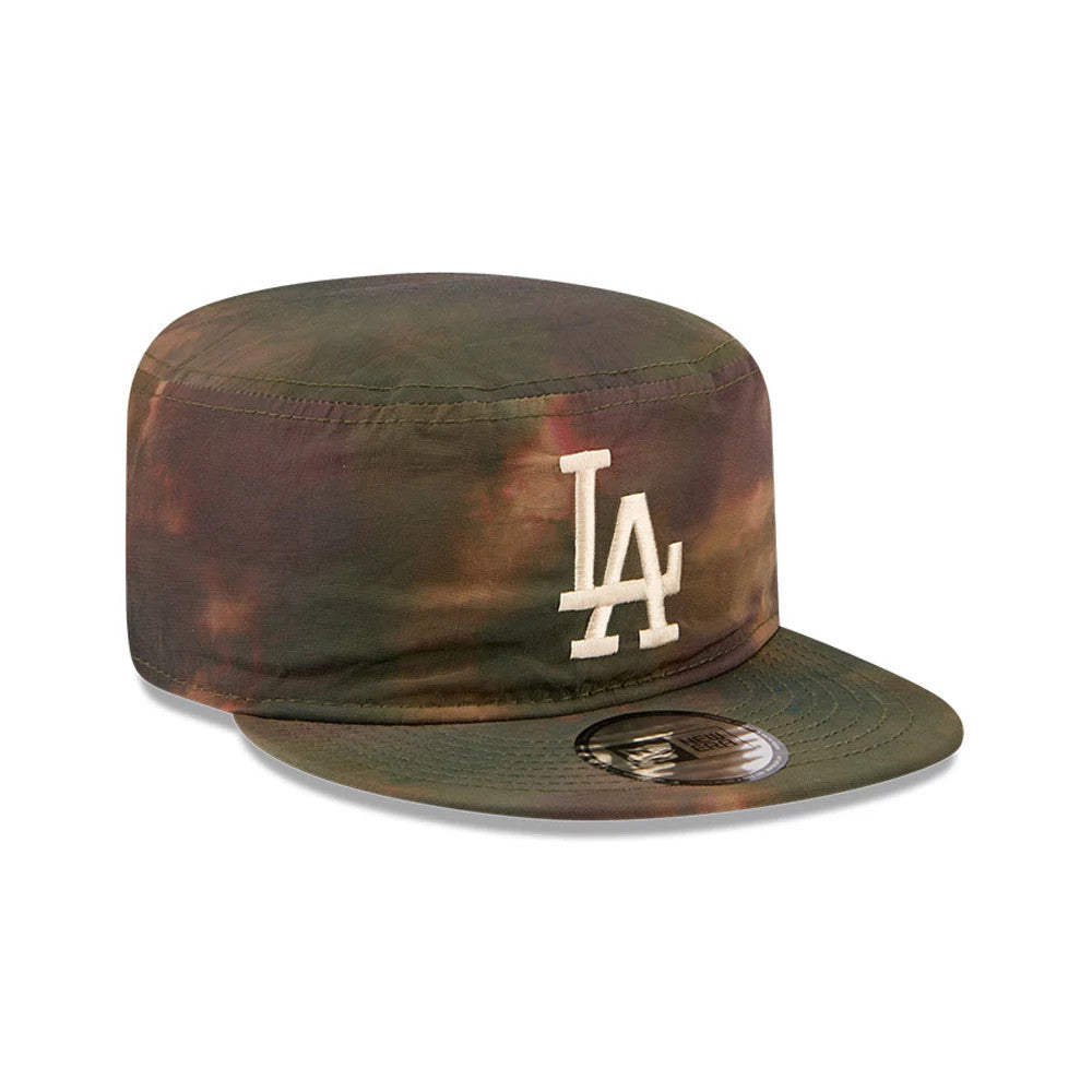 New Era LA Dodgers MLB Nylon Wash Dye Open Green Painter Cap, front view showing the white embroidered LA logo on the front panel, a curved visor in matching green tones, and the round size sticker affixed to the top of the visor.