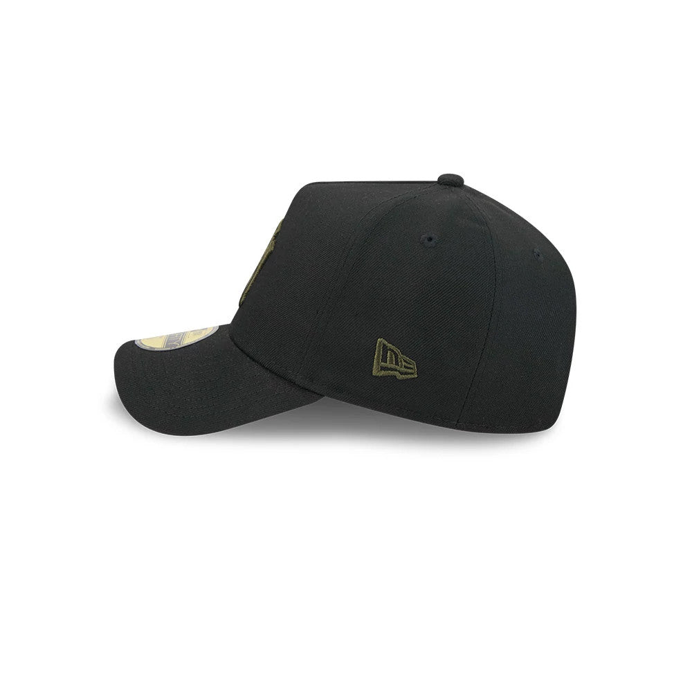 New York Yankees MLB X Alpha Black New Era 59FORTY A-Frame Fitted Cap, side view showing the olive green embroidered New Era flag logo on the left side, black curved visor with a gold 59FORTY size sticker and eyelets on the crown.