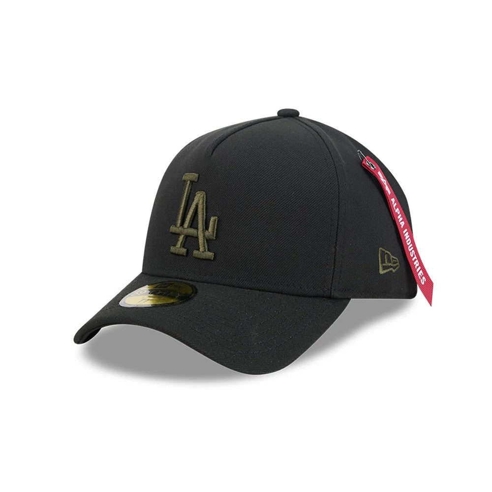 LA Dodgers MLB X Alpha Black New Era 59FORTY A-Frame Fitted Cap, three-quarter view showing an olive green raised embroidered LA logo on the front panel, a matching New Era flag on the left side, and a 59FORTY size sticker on the black curved visor.