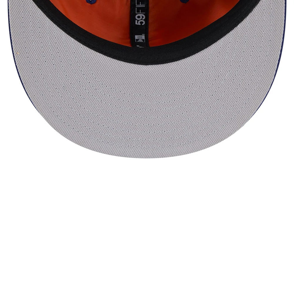 LA Dodgers MLB X Alpha Navy New Era 59FIFTY Fitted Cap, inside view showing the orange interior with black taping, 59FIFTY branding aligned centrally, and a contrasting grey undervisor with stitching details.