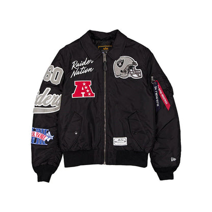 The model is wearing this NFL X Alpha Las Vegas Raiders Jacket in assorted print. 1