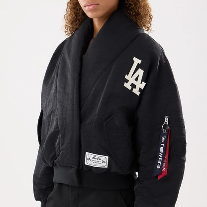 The model is wearing this MLB X Alpha LA Dodgers Jacket in black. 4