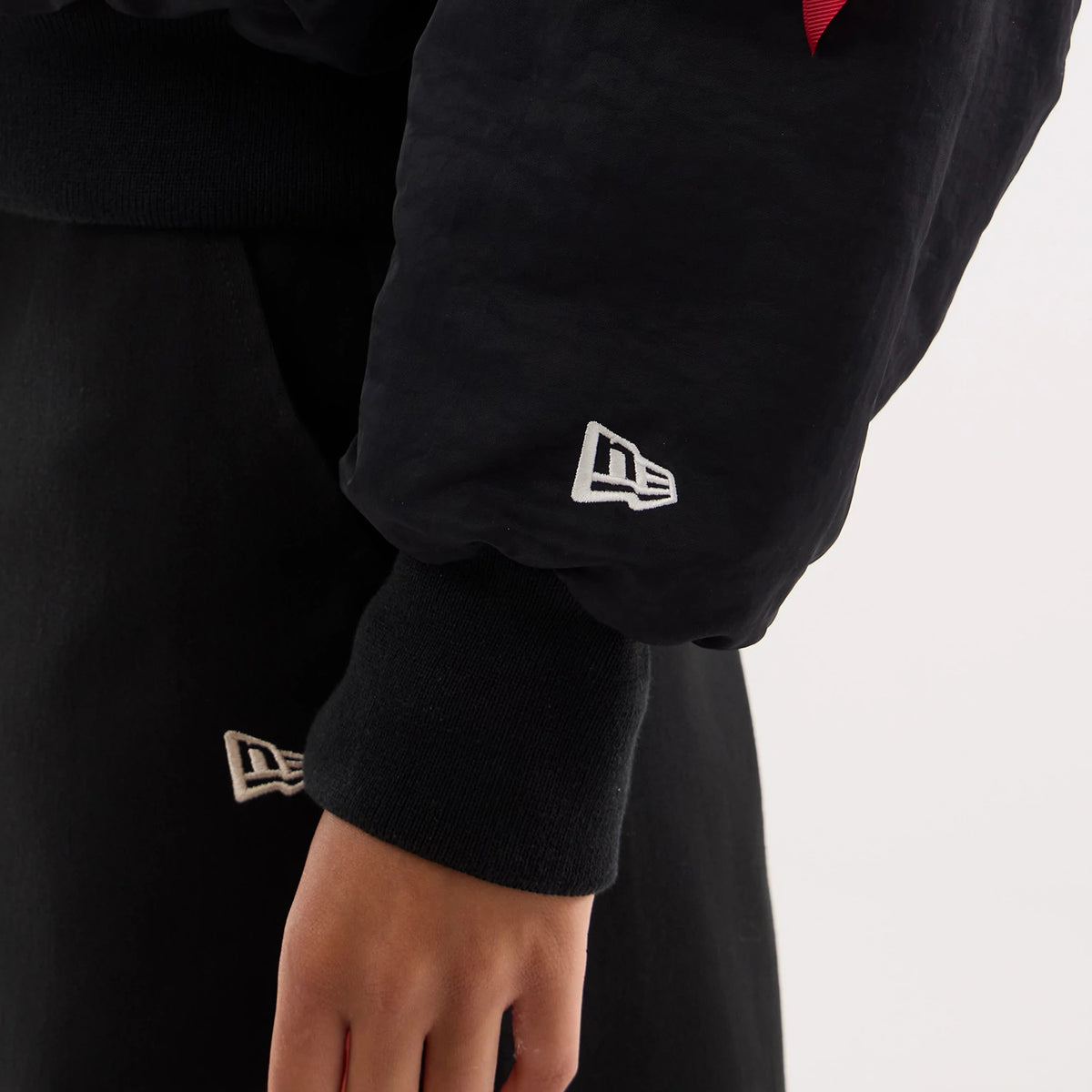 The model is wearing this MLB X Alpha LA Dodgers Jacket in black. 5